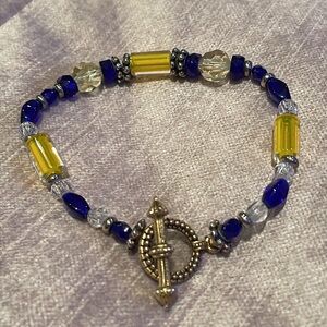 Royal blue & gold crystals and gold toned metal accents toggle clasp Bracelet 7”